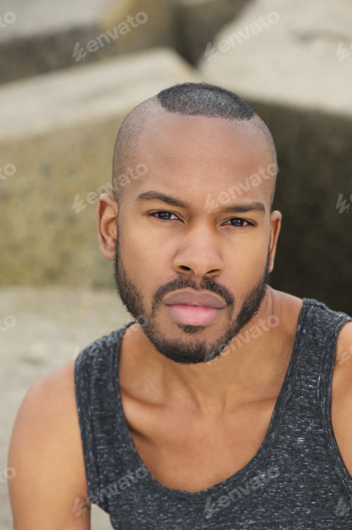 Preview: Portrait of a handsome young man outdoors