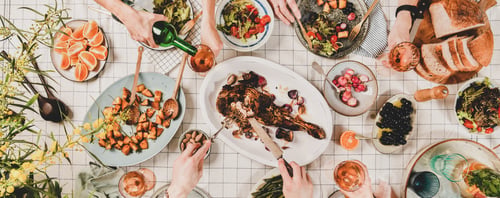 Preview: Flat-lay of people eating and drinking rose wine, wide composition