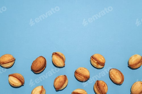 Preview: Cookies in the form of nuts on a blue background