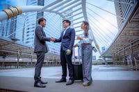 Preview: Businessman and woman discussion with teamwork about work goal by looked at laptop on hand ,Business