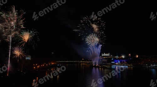Preview: Bright Fireworks Display Illuminates the Dark Night Sky