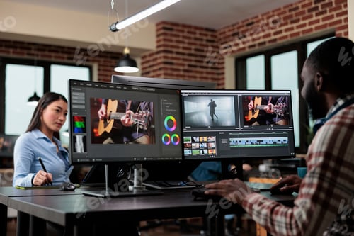 Preview: Creative agency professional employee editing movie footage using specialized software