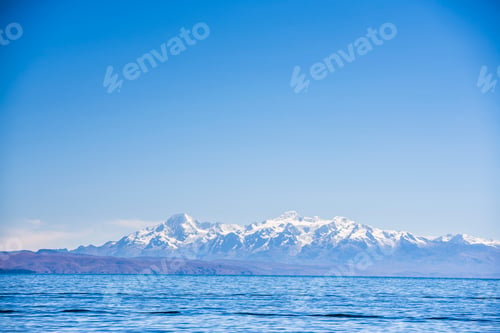 Preview: Cordillera Real Mountain Range (part of Andes Mountain Range) behind Lake Titicaca, seen from Isla d