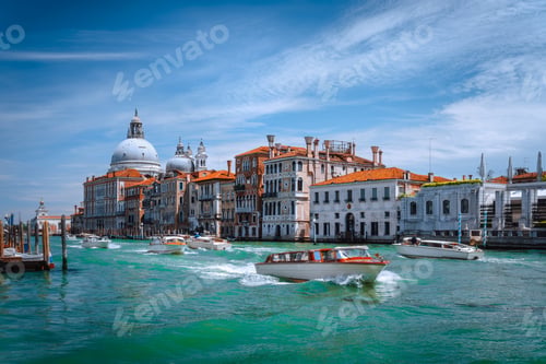Preview: Pleasure tourist boats on Grand Canal and Basilica Santa Maria della Salute, Venice, Italy