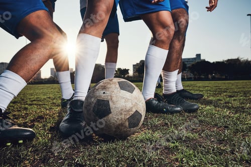 Preview: Closeup, ball and soccer with men, game and fitness with sports, competition and workout goals. Zoo