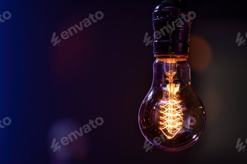 Preview: Close up burning lamp in the dark copy space.