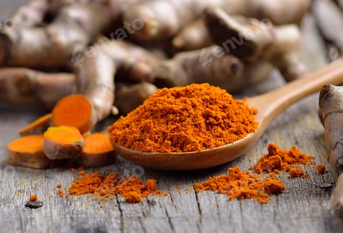 Preview: pile of fresh turmeric roots on wooden table