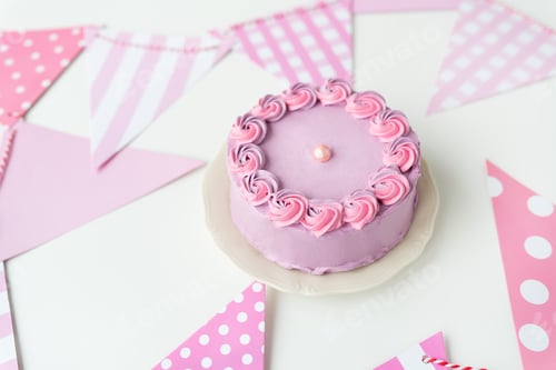 Preview: Celebratory Pink Cake with Pink and White Decorations