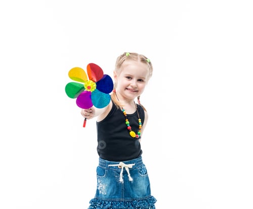Preview: smiling blonde kid with spinning toy wearing tanktop