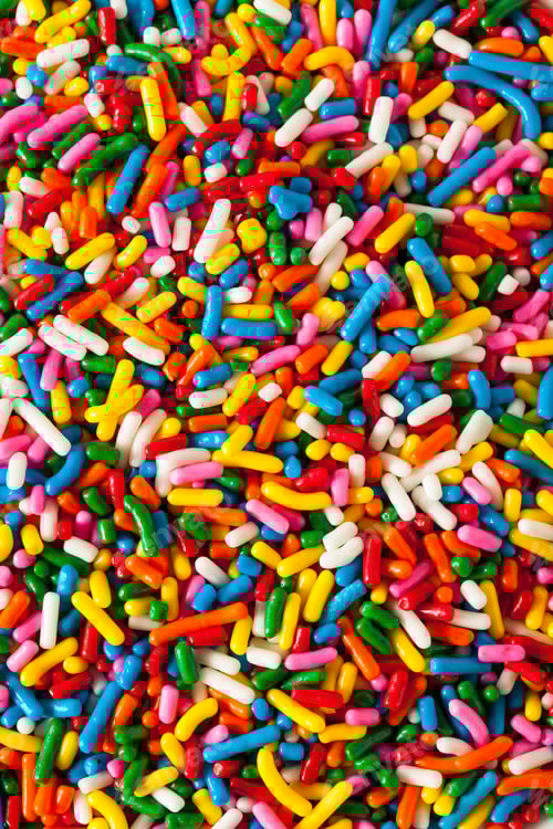 Preview: Vibrant Multicolored Sprinkles Background for Festive Design Projects