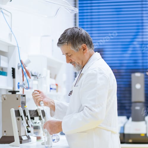 Preview: senior male researcher carrying out scientific research in a lab