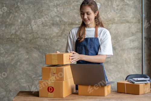 Preview: Portrait of Starting small businesses SME owners female entrepreneurs working on receipt box and che