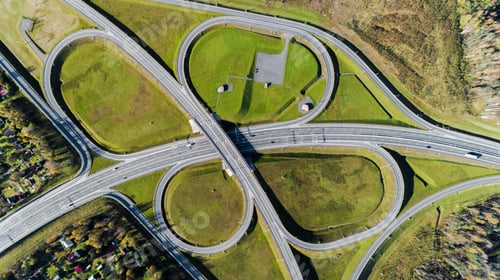 Preview: Aerial view of highway interchange Road junction Aerial photo of a highway going through the forest