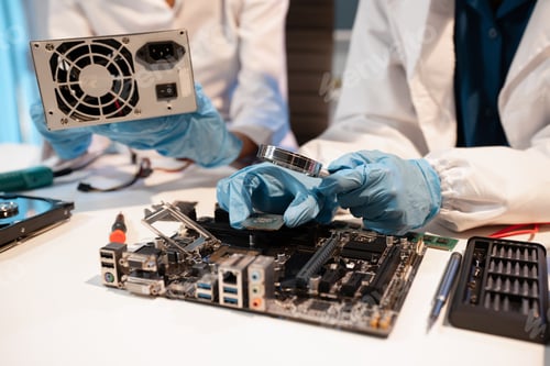 Preview: killed hands repairing electronic devices with precision. technology repair,