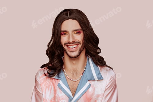 Preview: LGBTQ drag queen wearing wig on beige background