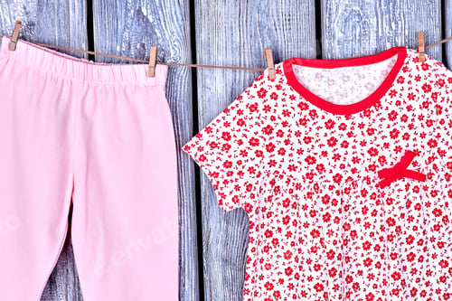 Preview: Kids clean apparel on clothesline