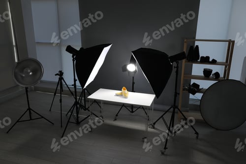 Preview: Professional photography equipment prepared for shooting stylish shoes in studio