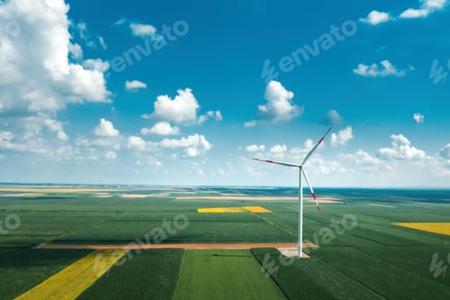 Preview: Aerial view of wind turbines on modern wind farm from drone pov