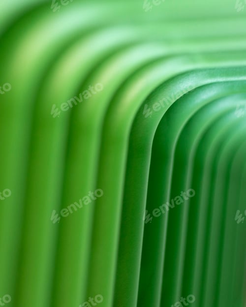 Preview: Selective focus shot of green plastic surface