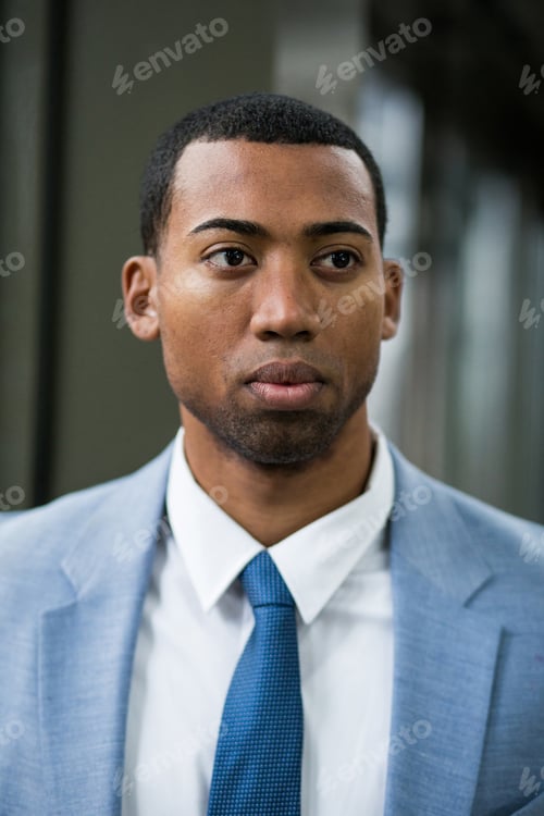 Preview: Young black businessman in suit