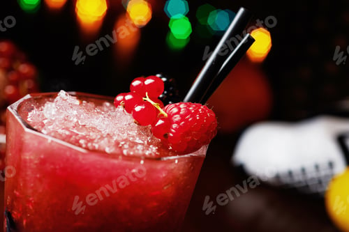 Preview: beautiful and tasty berries cocktail or lemonade with a nice bokeh. soft focus.