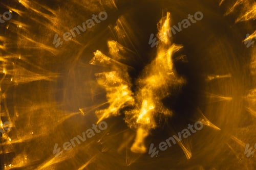 Preview: Yellow bokeh blurred lights with copy space on dark background