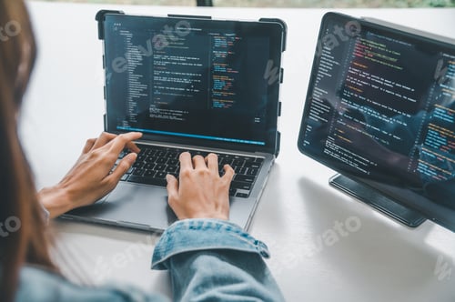 Preview: Female programmer working on coding, software development and web design.