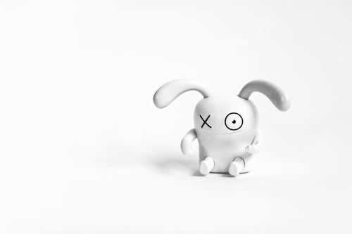 Preview: Figure of a funny white rabbit on a white background.