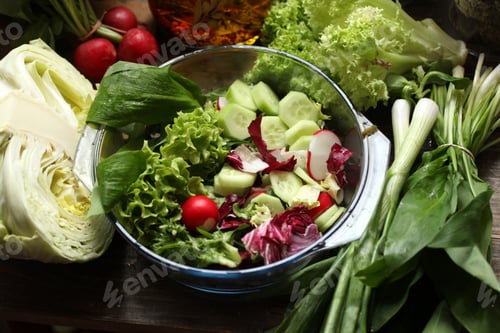 Preview: Healthy vitamin food. Fresh vegetable salad with olive oil.