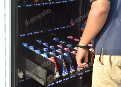 Preview: Local Snack Vending Machine Being Stocked by Supplier.