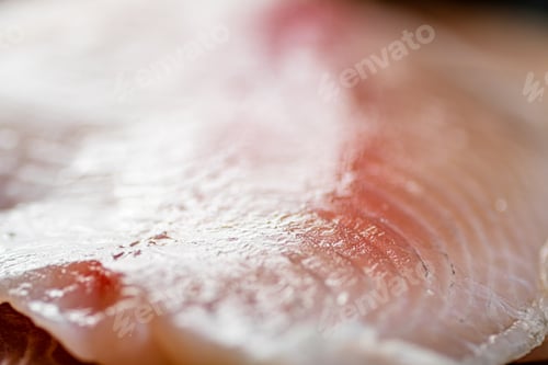 Preview: Raw fish fillet. Macro background. Texture of fish fillet.