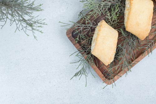 Preview: Two sweet delicious cookies on wooden cutting board
