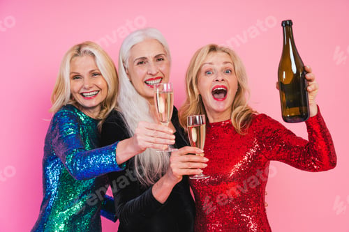 Preview: Happy senior women having party