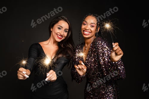 Preview: Beautiful happy girlfriends have Christmas party on black background
