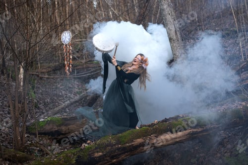 Preview: Wild Woman Playing Shamanic Drum Standing On Green Moss Tree Trunk In Forest, White Smoke Bomb