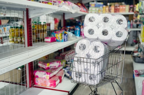 Preview: Customer hoarding tissue, toilet paper on shopping cart in retailer