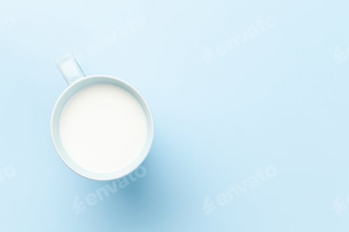 Preview: Milk cup on blue background