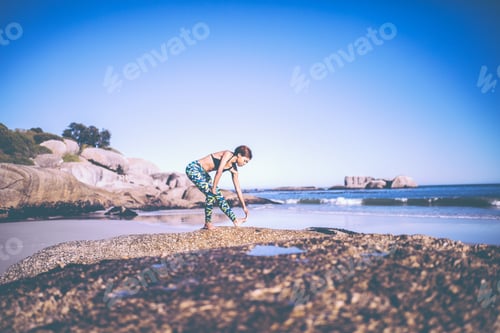 Preview: Afro American Women doing Fitness exercise on beach