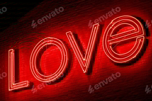 Preview: Glowing Red Neon Love Sign on Brick Wall