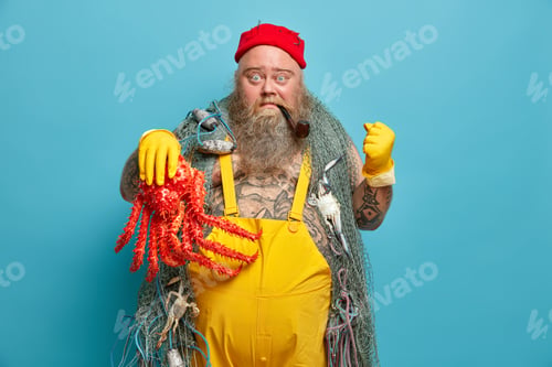 Preview: Serious bearded boat captain clenches fist as warns about revenge holds sea creature keeps smoking p