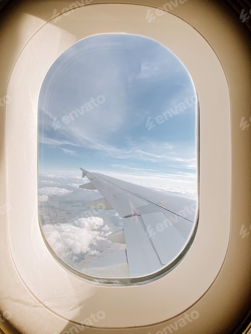 Preview: Window of a plane with the wing on it