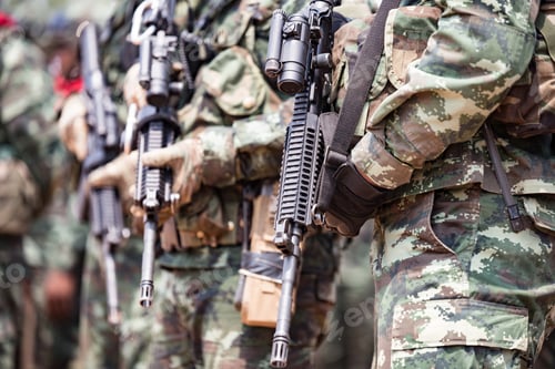Preview: Soldiers with weapons on military combat training.