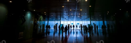 Preview: Inside view of train station with traveler people in silhouette. Concept of travel activity