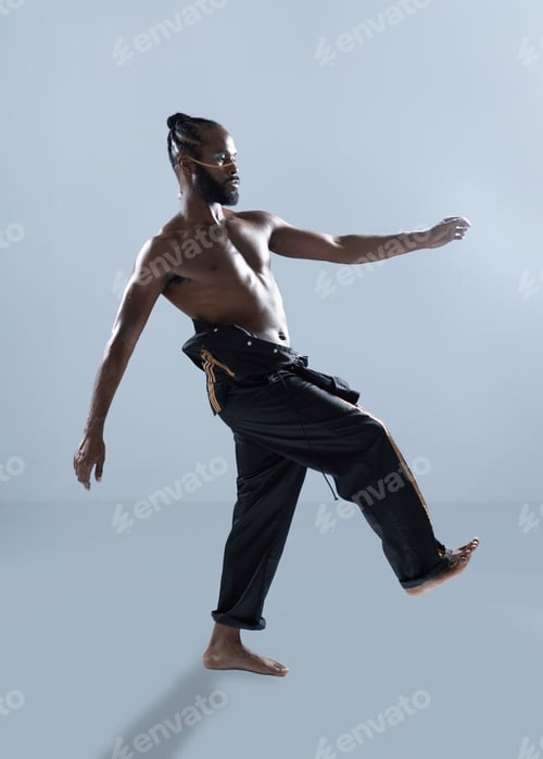 Preview: Black gay man confidently walking on light blue background