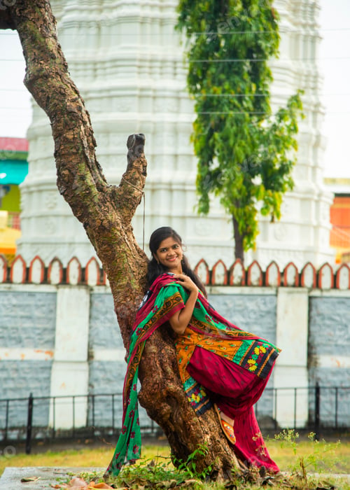 Preview: Happy young beautiful Indian woman at the park outdoor