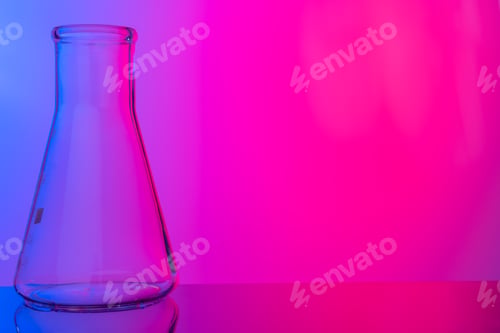 Preview: Chemical glassware close up on neon pink-purple background