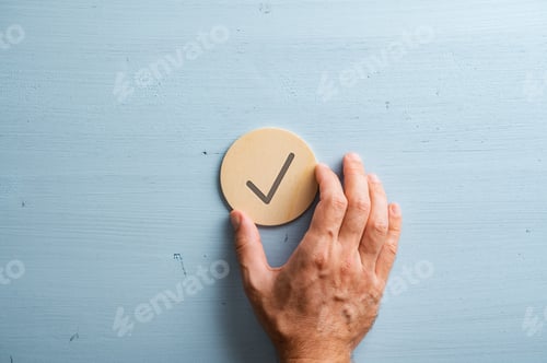 Preview: Wooden cut circle with a check mark on it