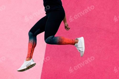 Preview: Young man running and working out with a pink wall on the background