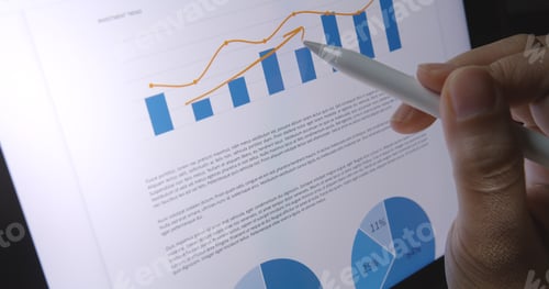 Preview: Close-up hand use pen write check growth data number on touch screen