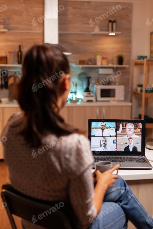 Preview: Woman Attending Virtual Meeting from Home Office